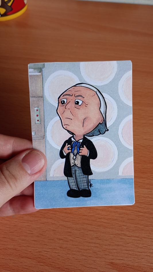 Hand holding a Large rectangular sticker with a picture of a Chibi Doctor Who drawing